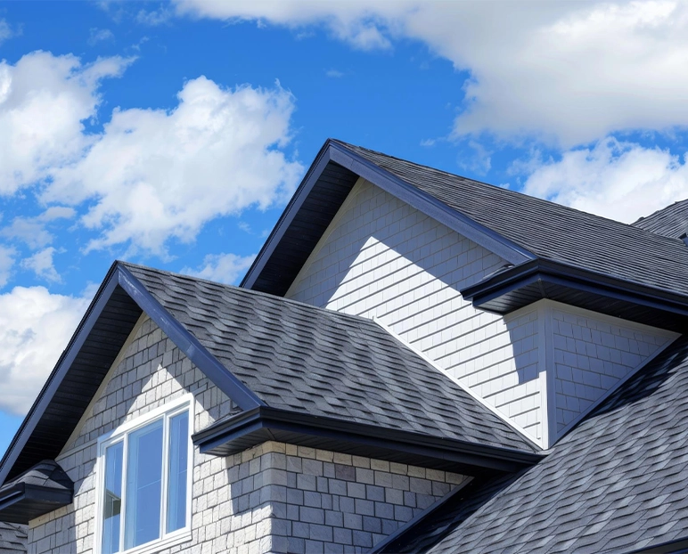 Beautiful residential home featuring premium architectural asphalt shingles and professionally installed roofing system.
